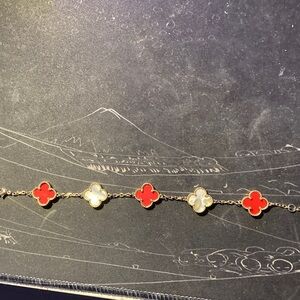 Elegant Red and White Clover Bracelet